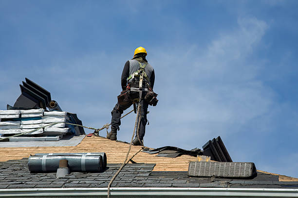 Professional Roof Replacement technician working in Monroe, IN